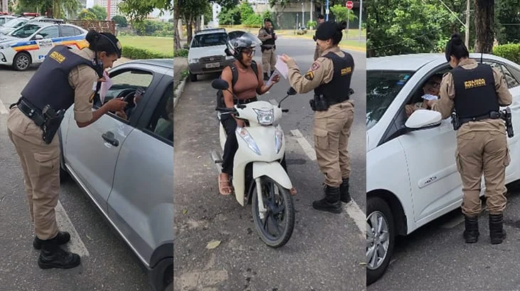 As policiais distribuindo brownie para as mulheres motoristas e motociclistas durante a Blitz Doce